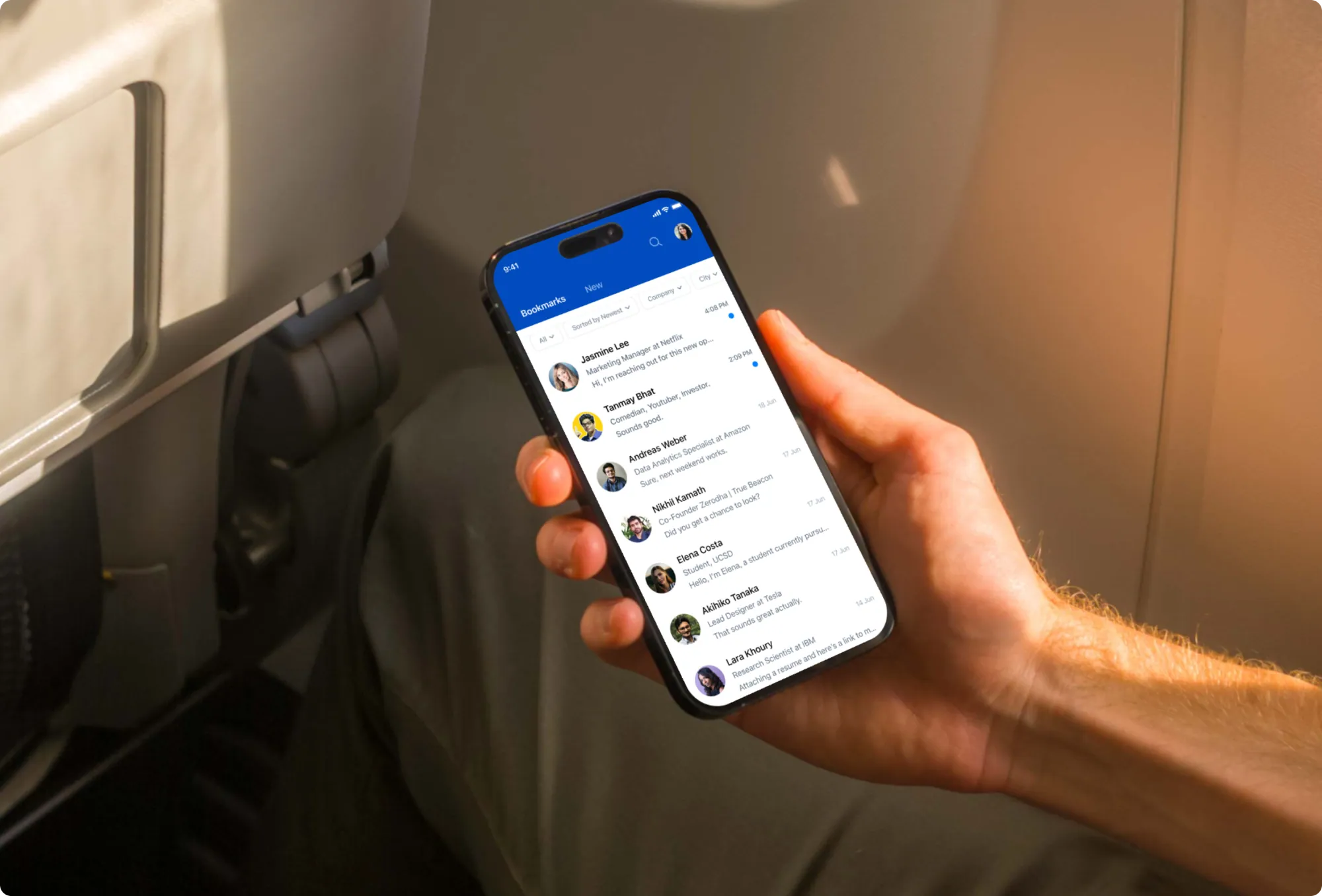 A person holding a phone showing the Dockit application