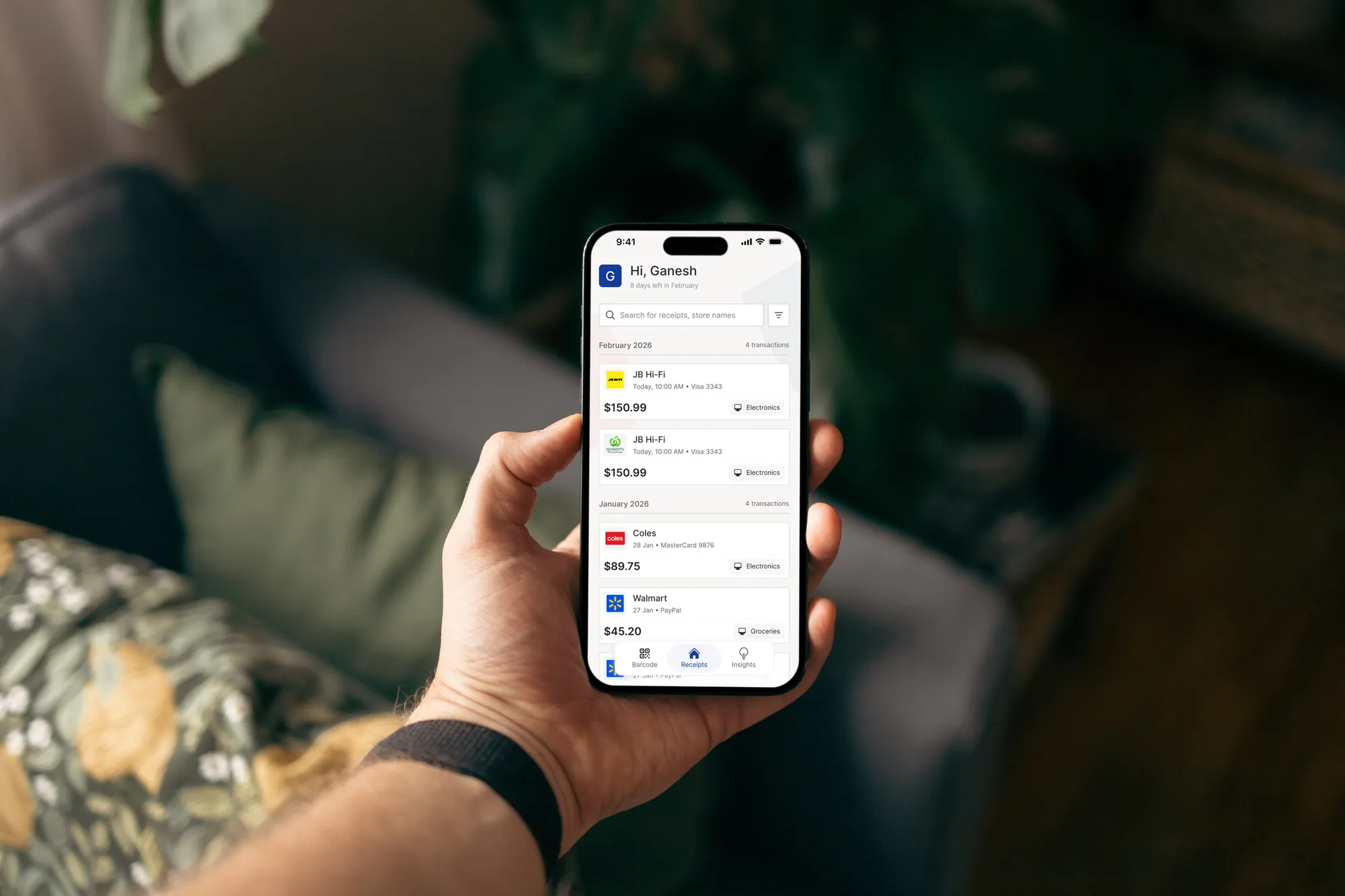 A person holding a phone displaying the Dockit app